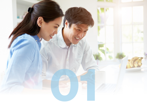 A young couple researching on their laptop computer