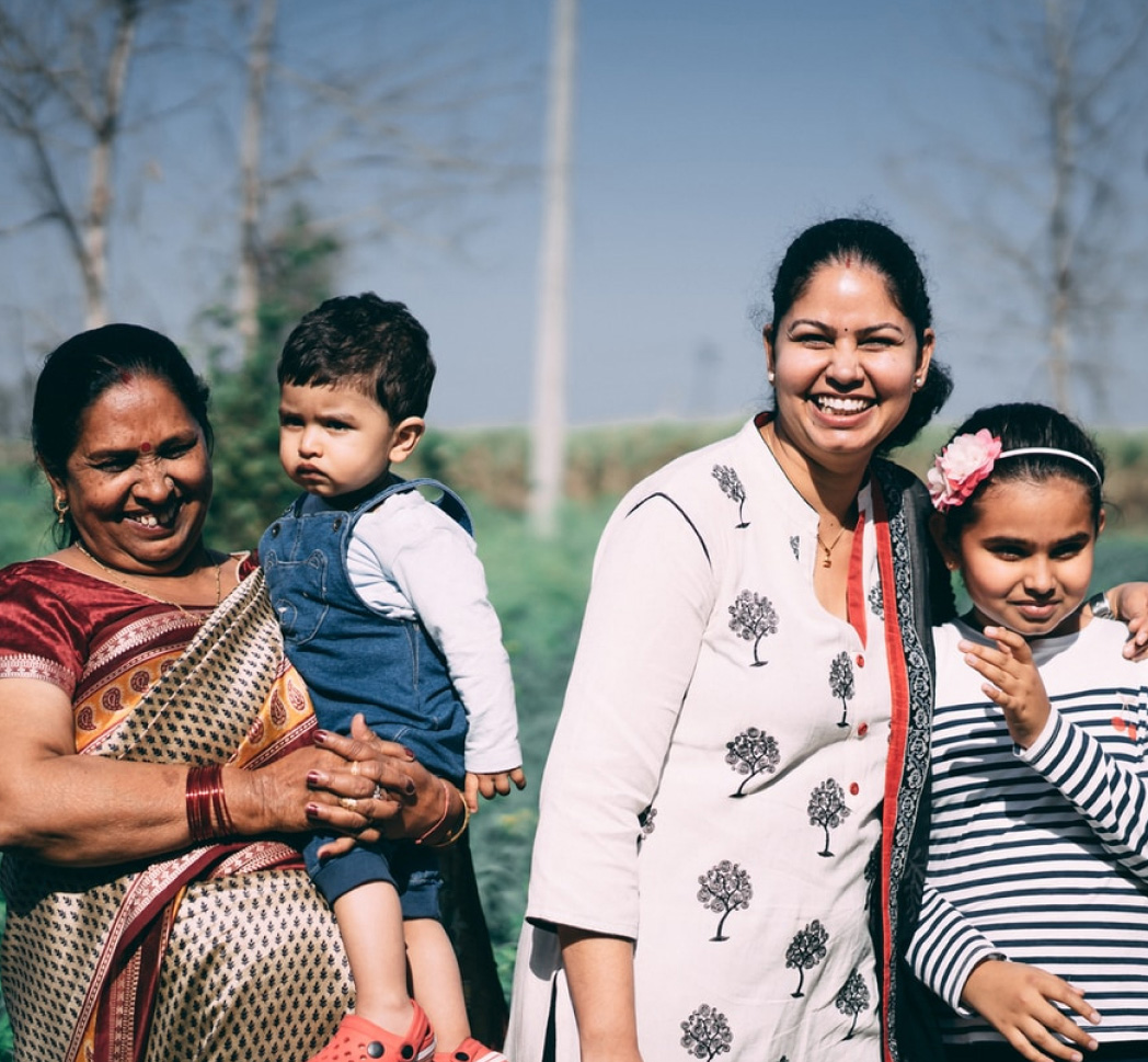 A proud mother and Grandmother with beautiful smiles