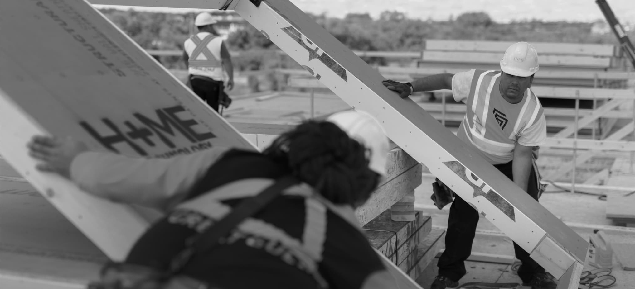 Great Gulf Construction workers lifting a pre-fabricated wall.